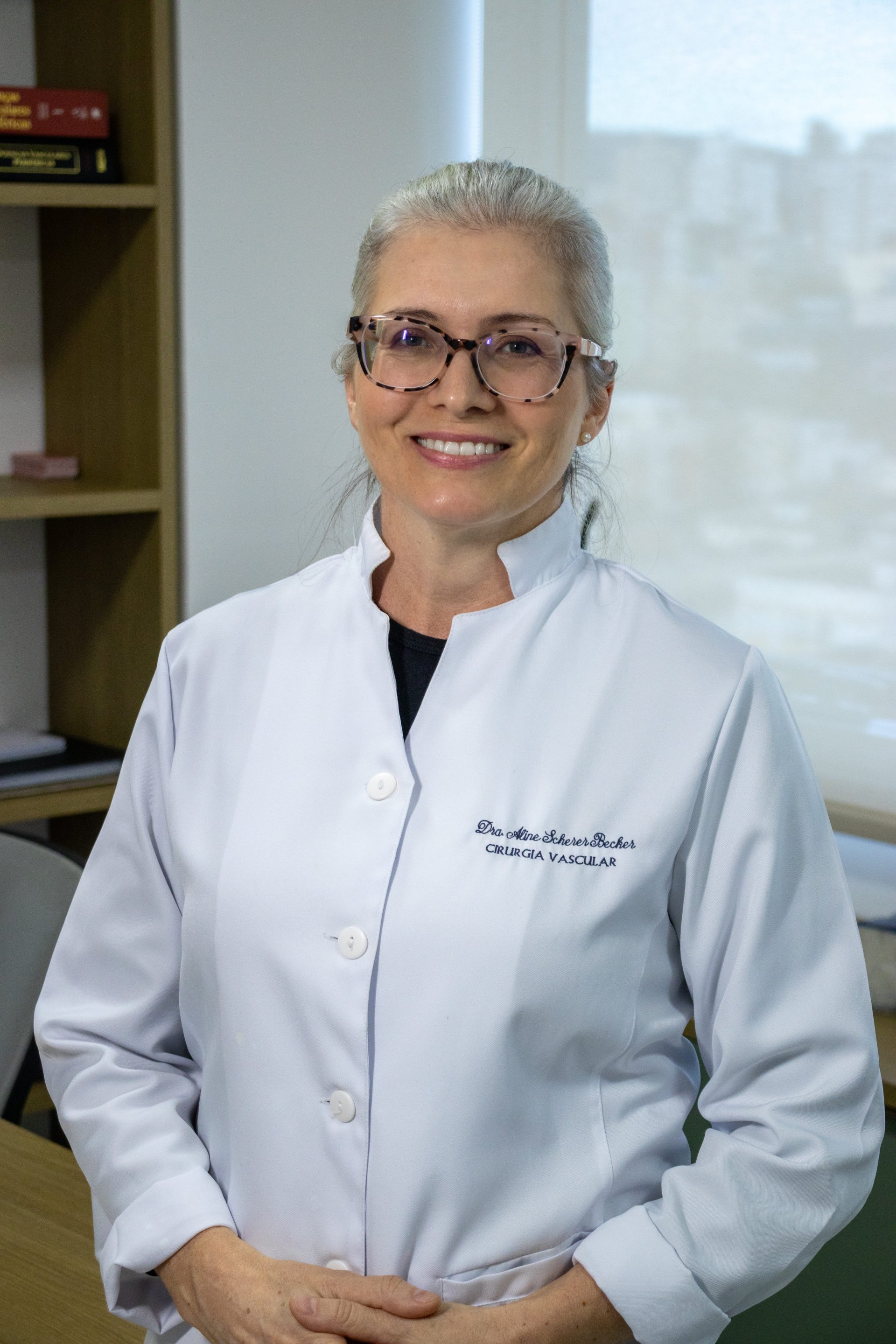 Dra. Aline Scherer Becker